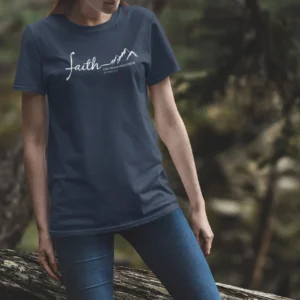 Woman wearing Faith Can Move Mountains Christian T-Shirt inspired by Matthew 17:20