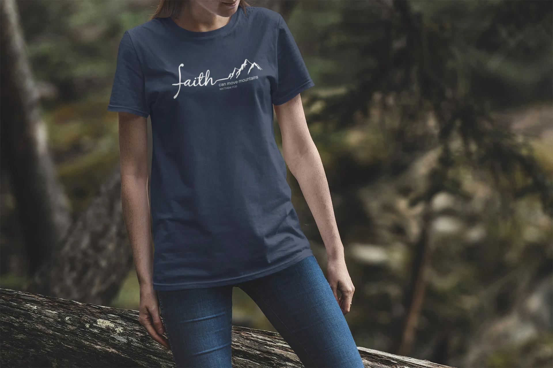 Woman wearing Faith Can Move Mountains Christian T-Shirt inspired by Matthew 17:20